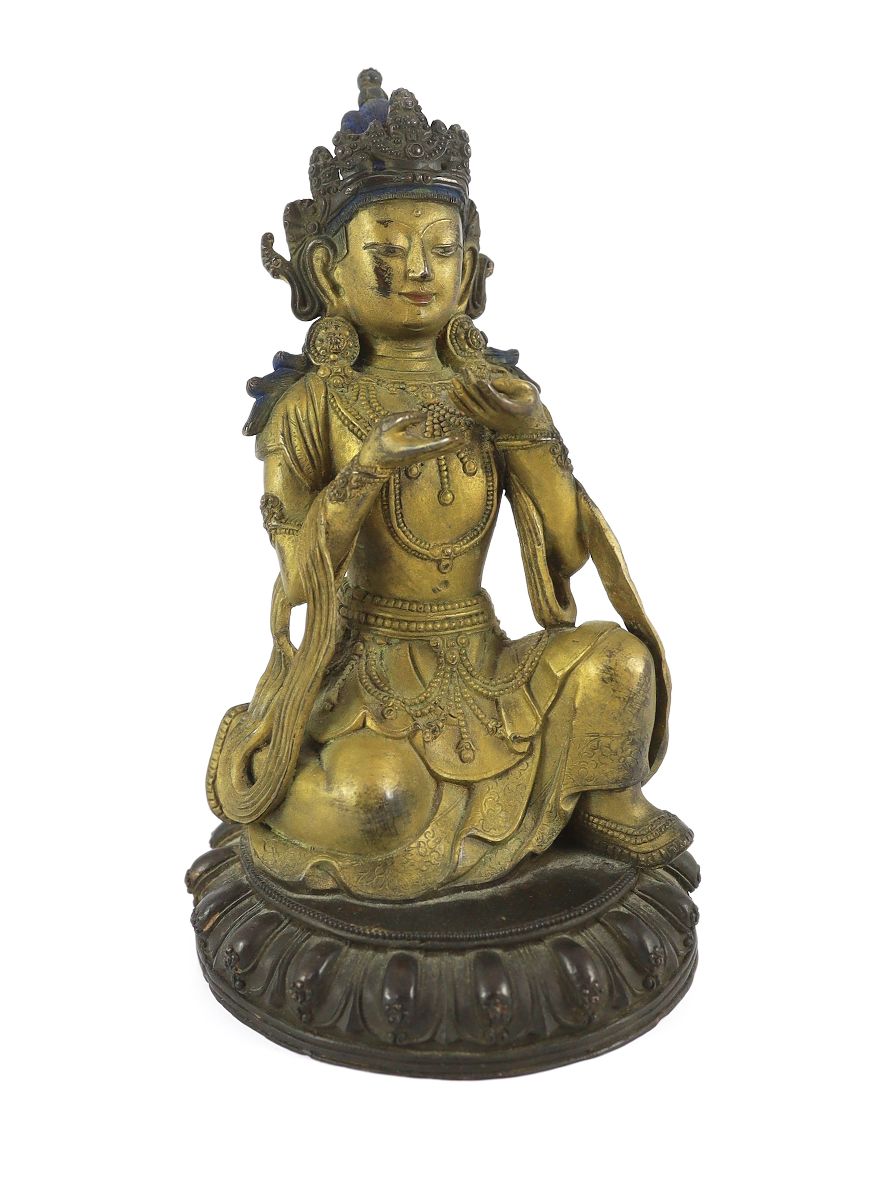 A Chinese gilt bronze figure of a kneeling Bodhisattva